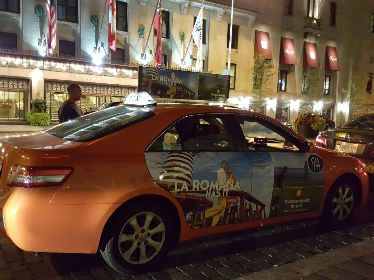 All around Toronto taxi cabs feature banner ads from the Dominican's top destinations for Turism
